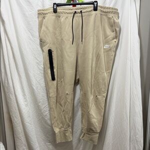 Nike Tech Women's Beige Joggers with Black Details